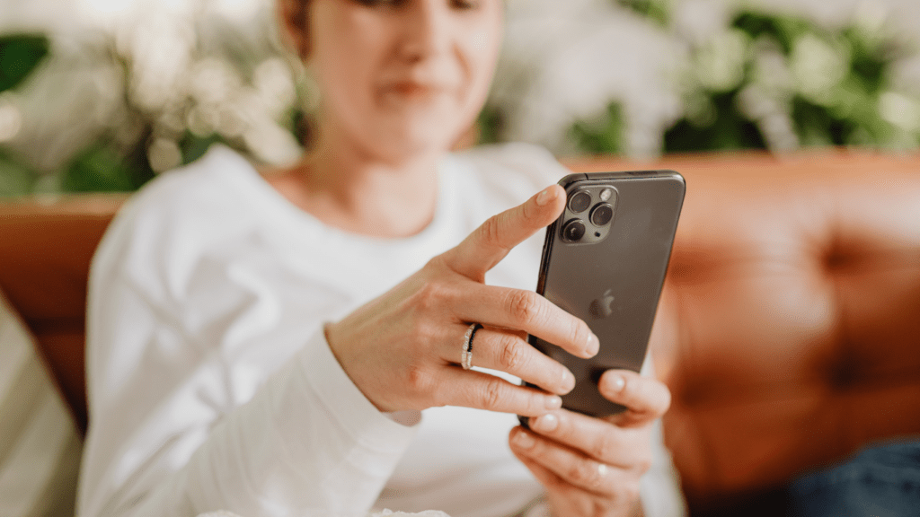 Woman using cellphone to gamble