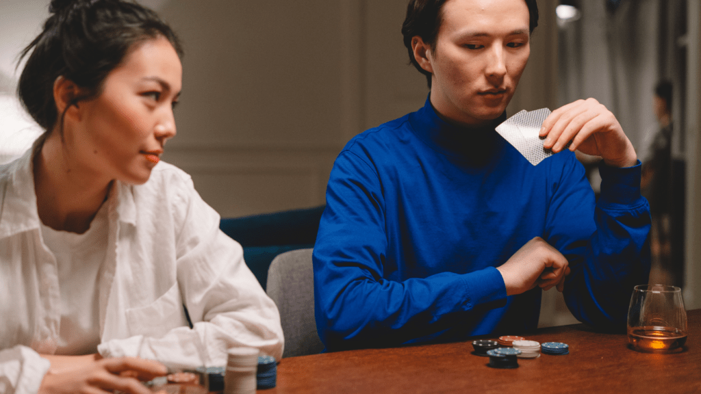 Man and Woman playing Poker