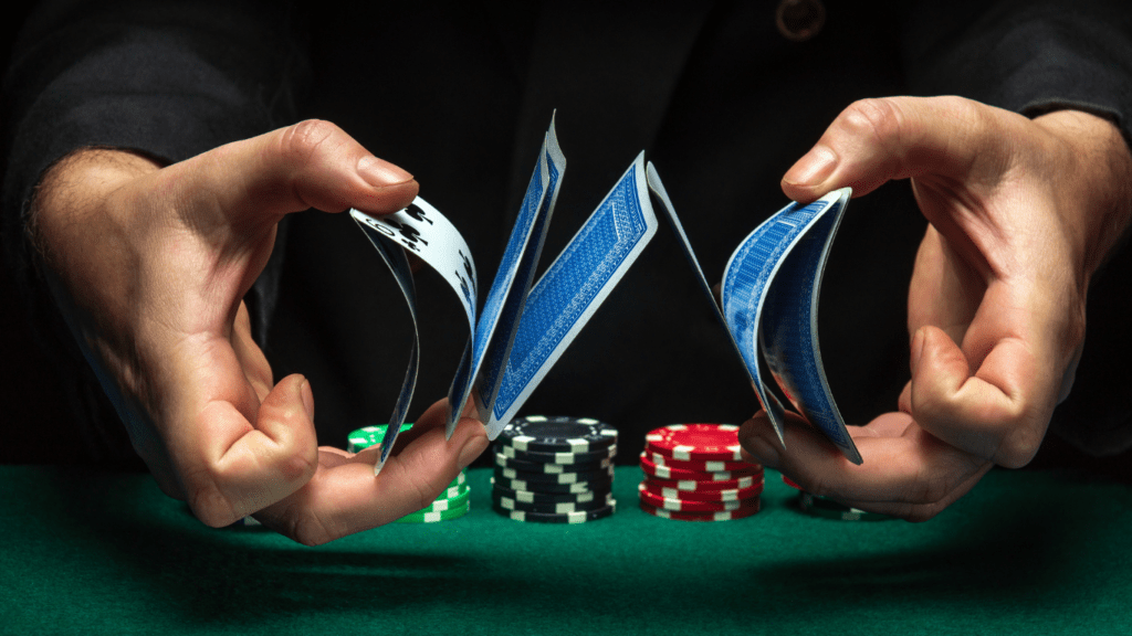 A Man shuffling the playing cards 