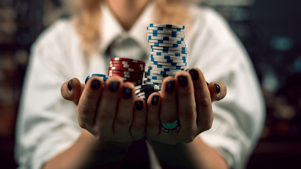 Pile of Casino chips on hand