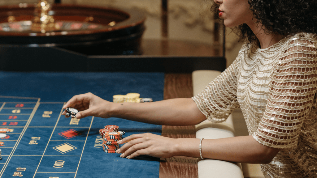 Woman Betting on a roulette table